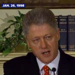 Bill Clinton standing in a press conference on January 26, 1998
