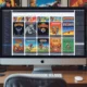User browsing MobyGames database on a computer, viewing game covers and credits from different platforms.
