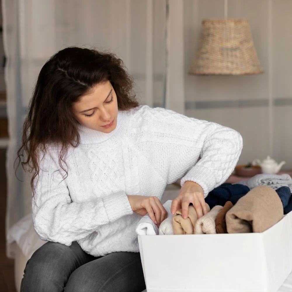woman searching in drawer
