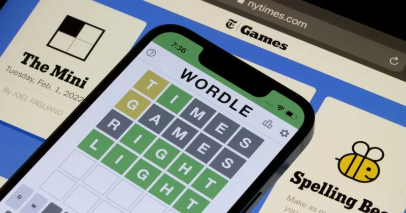 solving a NYT Mini Crossword on a tablet showing the clue “Pesky little twerp” with the answer