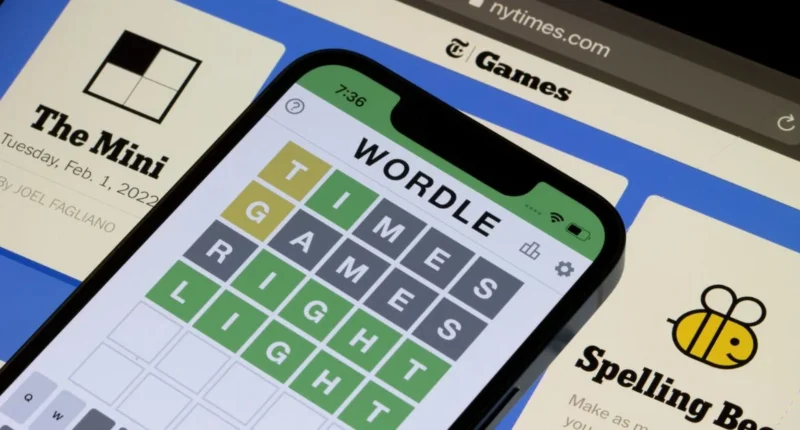 solving a NYT Mini Crossword on a tablet showing the clue “Pesky little twerp” with the answer
