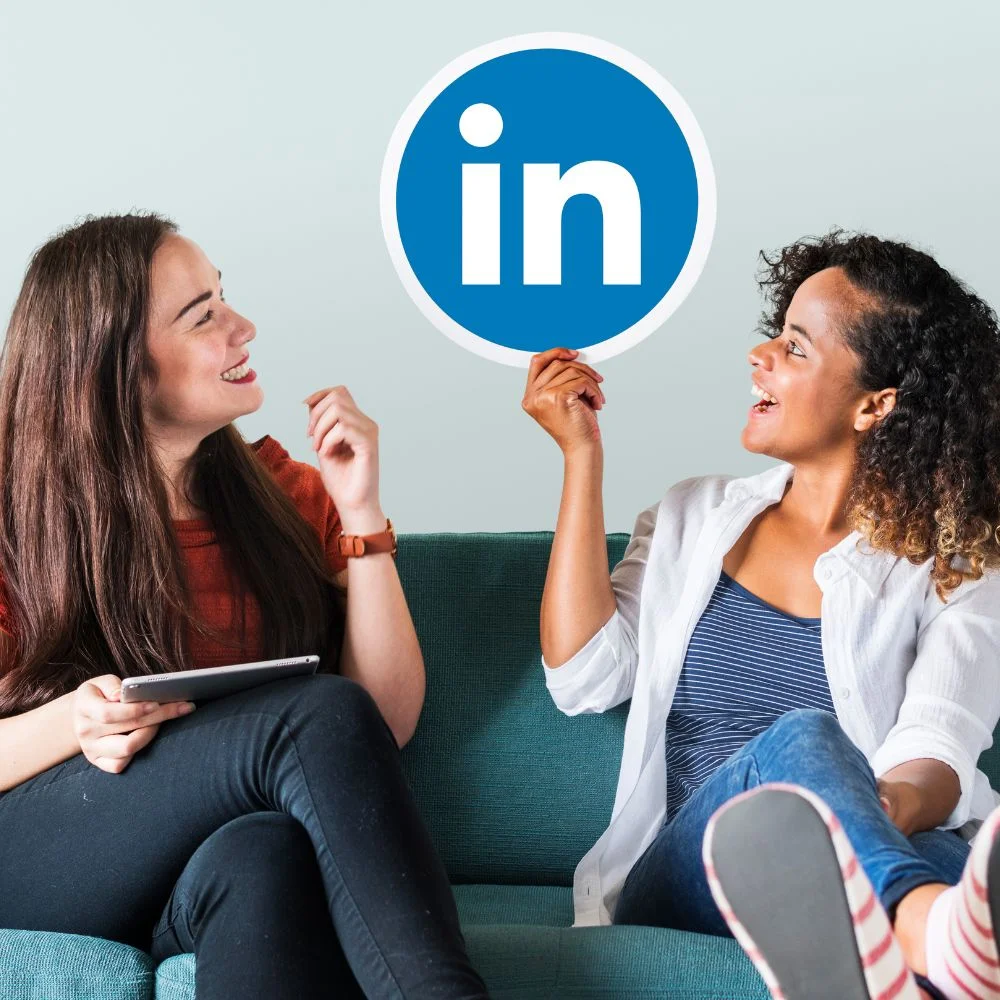 women holding linkedin logo