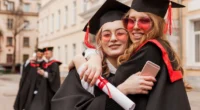 gratuated-colleagues-hugging