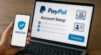 A person verifying their PayPal account using a laptop and smartphone.